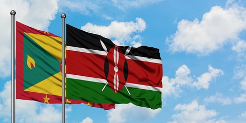 Grenada and Kenya flag waving in the wind against white cloudy blue sky together. Diplomacy concept, international relations.