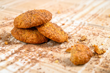 Homemade oatmeal cookies on a tablecloth