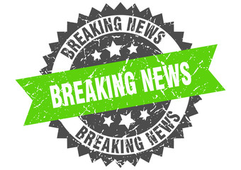 breaking news grunge stamp with green band. breaking news