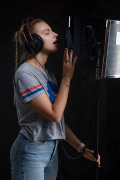 Young Pretty Singer Is Recording Her New Album At Recording Studio.