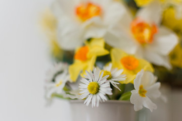 Small Buddha Statue with Daffodils