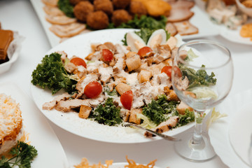 Different luxury food snacks and appetizers, concept of decorated catering banquet set, on a party event celebration. Catering food concept.