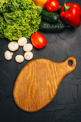 fresh vegetables on wooden board