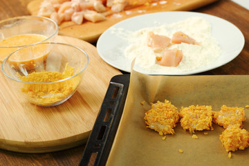 Roll chicken fillet in flour