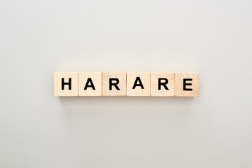 top view of wooden blocks with Harare lettering on grey background
