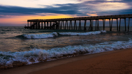 Sea pier in the early dawn morning