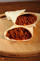 Beef tortilla with chili sauce. Enchilada.