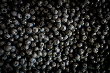 Fresh raw blueberries as background, top view