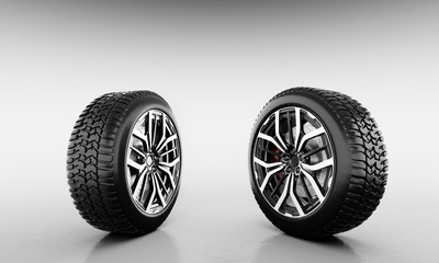 Wheels with modern alu rims on white background