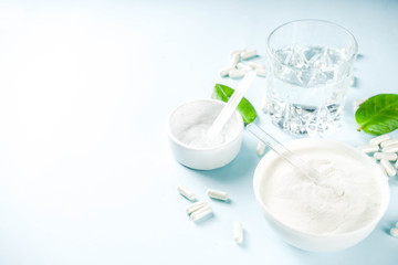 Three types of collagen: pills, gel cosmetics for the face, powder. Healthy lifestyle concept. Copy space