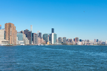 Fototapeta na wymiar The East River with the Midtown New York City Skyline