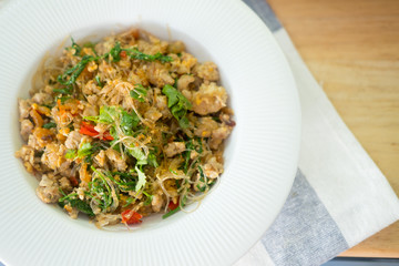 Stir fried vermicelli with minced pork and Cha-om leave