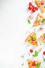 Tuinposter Pieces of cheese pizza Margarita with ingredients and herbs. White stone background top view © ricka_kinamoto