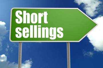 Short selling word with green road sign