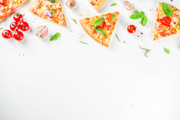 Pieces of cheese pizza Margarita with ingredients and herbs. White stone background top view