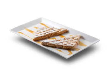 waffles on a plate isolated on white background. Waffles en un plato aislado sobre fondo blanco.