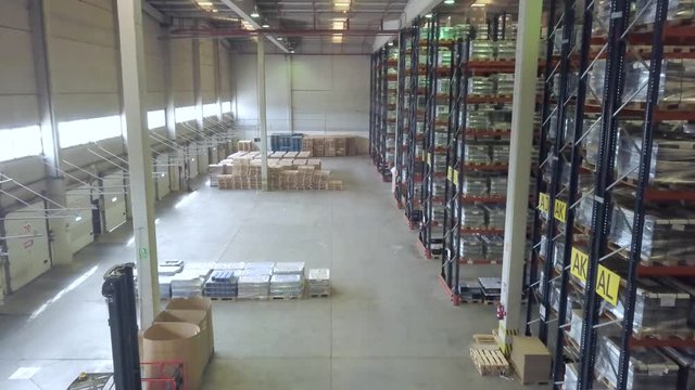 vertical load in logistics warehouse. pallet racks