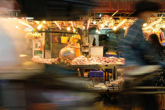 A local butchers shop in a wet market.