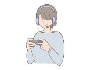 ヘッドセットをつけてゲームをする女性