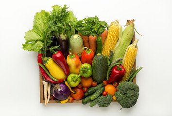 Healthy harvest of vegetables in organic wooden box