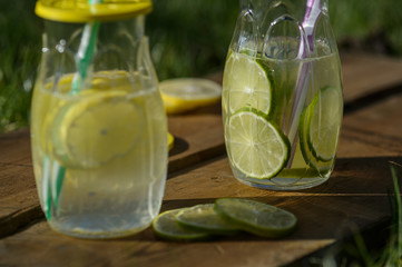 lemon and lime lemonade in the sun in the garden