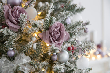 Christmas decorations in photo studio. Interior with snowman, Christmas tree, lanterns, deer and others. 