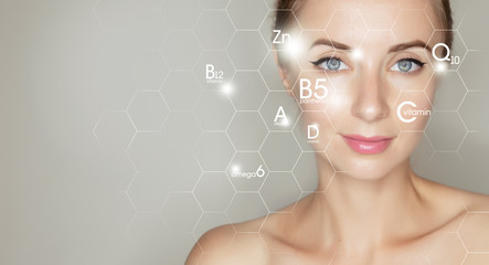 woman face portrait with graphic icons of vitamins and minerals for skin treatment