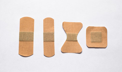 Set of adhesive plasters isolated on white background