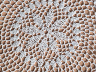 white fabric doily