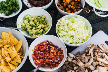 BBQ mexican salad selection in bowls summer