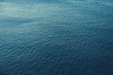 Blue sea surface with waves aerial view