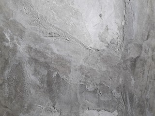 Naklejka premium Gray cement walls are suitable for making a construction industry background.