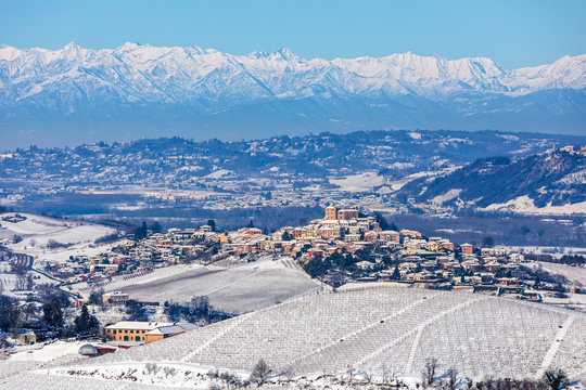 Small town on the hills coverd in snow in Northern Italy.