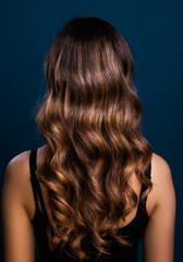 Balayage modern hair style long hair, model in studio, poster ready, isolated close up