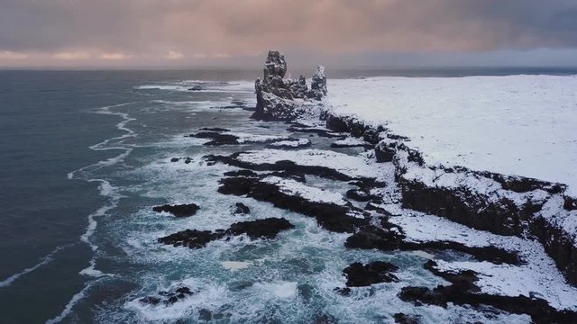 Aerial drone orbit at Londrangar cliffs, Snaefellsnes peninsula, Iceland 