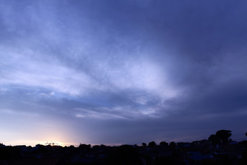 a blue sky in summer above us