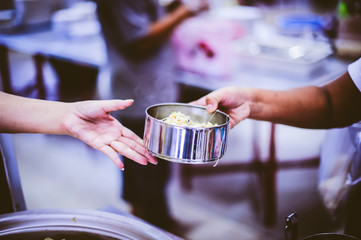 Food donation to the poor in human society : the concept of helping each other