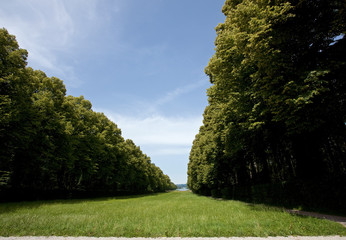 Park alley of the Herrenchiemsee royal palace of King Ludwig II of Bavaria (bavarian versailles), 