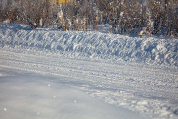 The road in the village in the snow