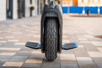 Electric Unicycle On Street, Personal Electric Transport Technology © toyechkina