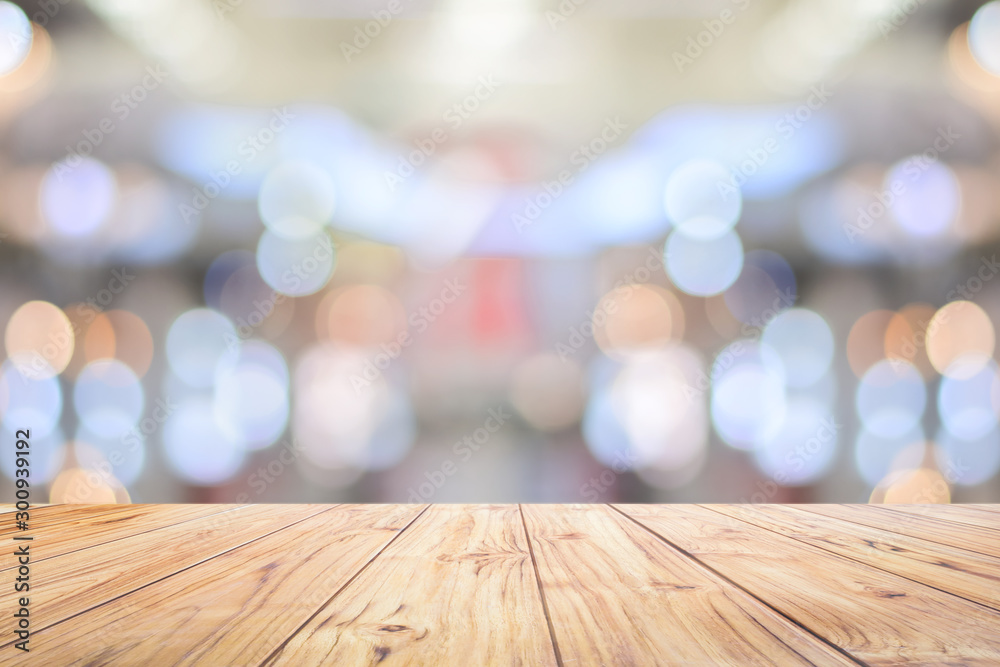 Aufkleber Wood Table Top Counter on bright bokeh interior background with white table top for backdrop design,lights blurred bokeh blurred background for montage product
