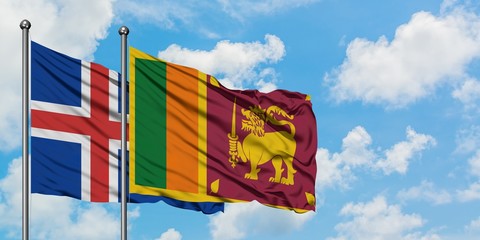 Iceland and Sri Lanka flag waving in the wind against white cloudy blue sky together. Diplomacy concept, international relations.