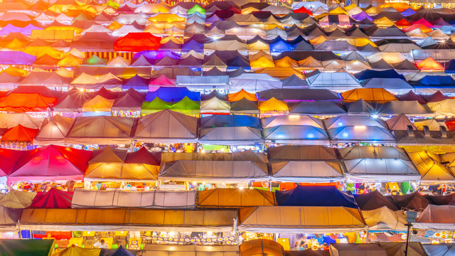 Train night market Ratchada during twilight sky.Famous street market in Bangkok and tourist attraction.
