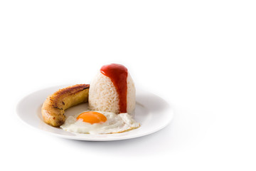 Arroz a la cubana.Typical Cuban rice with fried banana and fried egg on a plate. Copy space