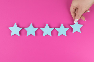 Customer satisfaction survey, excellent services rating concepts. five star symbol, blue stars on...
