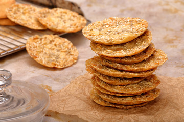 Crunchy cookies with sesame, closeup of cakes in the bakery