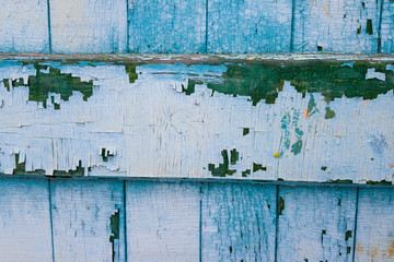 Vintage wooden old fence blue color. background