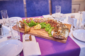 Fat juicy silver carp baked in the oven
