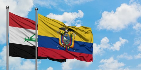 Iraq and Ecuador flag waving in the wind against white cloudy blue sky together. Diplomacy concept, international relations.