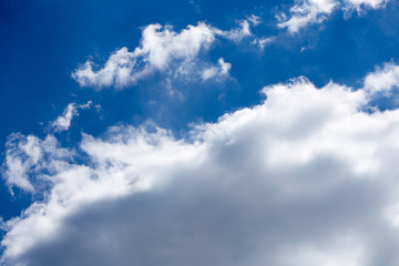 Beautiful blue sky with white clouds nature background. Cloudscape in light day